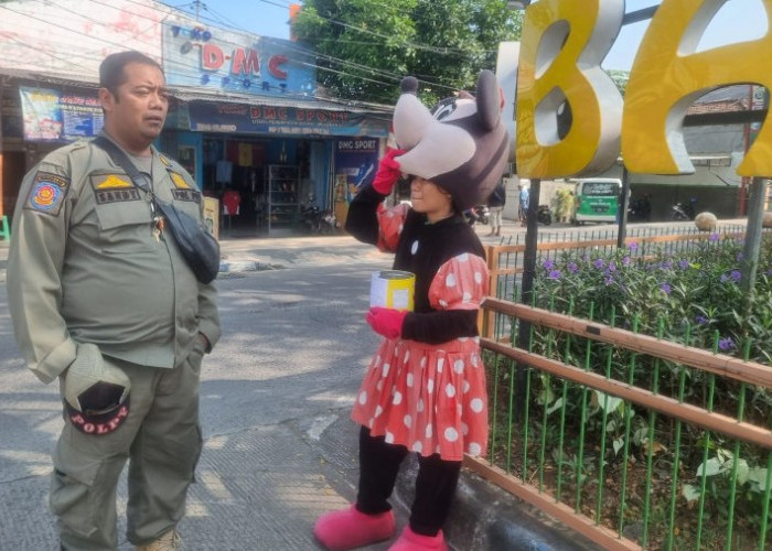 Petugas Tertibkan Empat Belas Pengamen dan Pengemis di Simpang RA Basoeni Sooko Mojokerto Selama Tiga Pekan